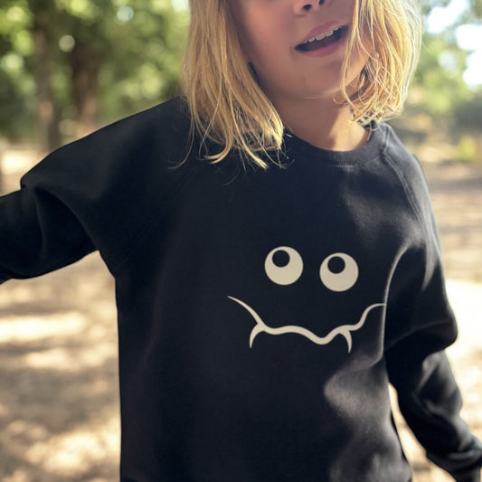 girl wearing bob and blossom black monster sweatshirt at whippersnappers online